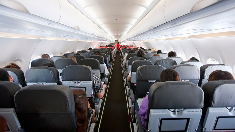 Major airline's flight delayed after 'no smoking' signs are discovered missing